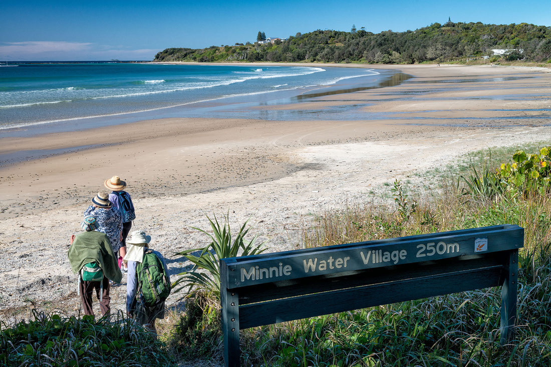 Walking onto Minnie Water beach