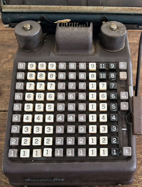 Pre-decimal currency manual adding machine, Miles Historical Mus